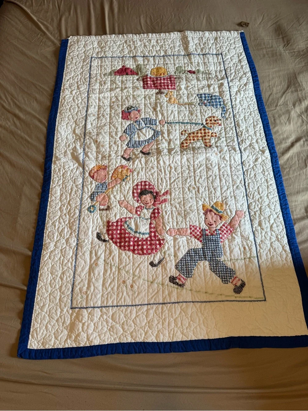 Vintage embroidered kids quilt
